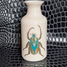 Porcelain vase with stag beetle decoration