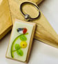 Red Robin and yellow flower glass keyring. 