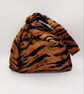 Knot bag in faux tiger fur, reversible.  - Image 1
