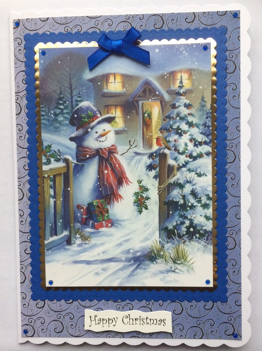 Christmas Card Waving Snowman Cottage and Christmas Tree