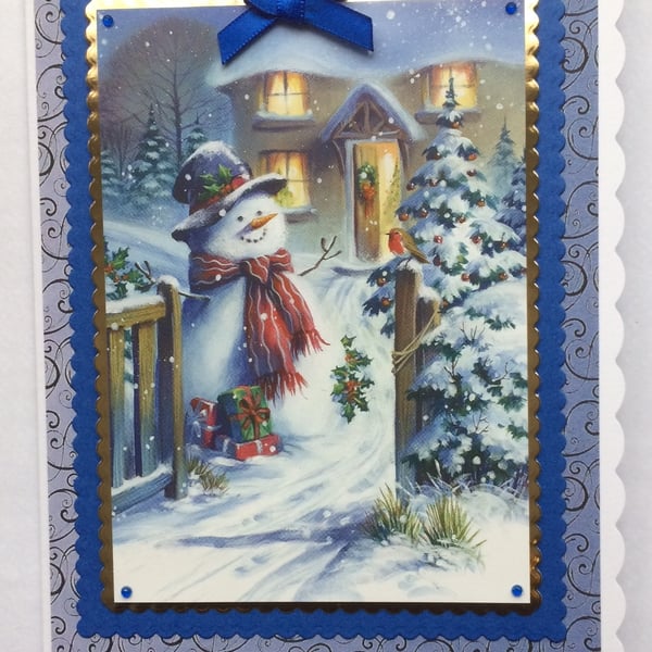 Christmas Card Waving Snowman Cottage and Christmas Tree