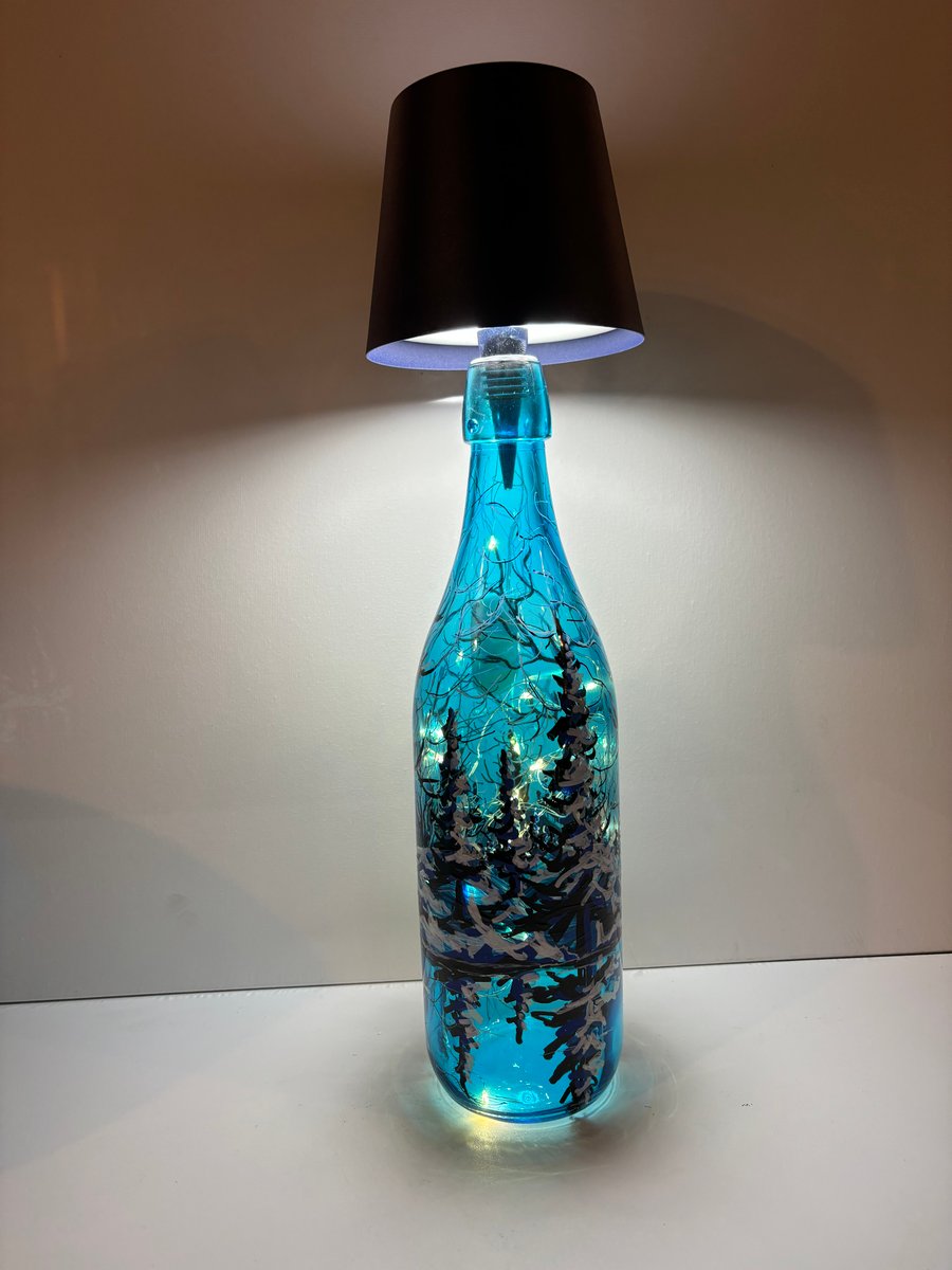 A hand painted and fired glass lamp by Andrew Jenkins 