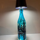 A hand painted and fired glass lamp by Andrew Jenkins 