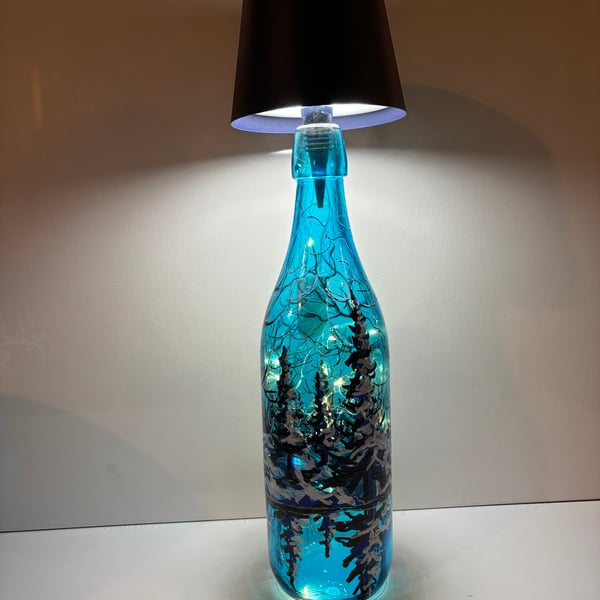 A hand painted and fired glass lamp by Andrew Jenkins 