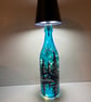 A hand painted and fired glass lamp by Andrew Jenkins 
