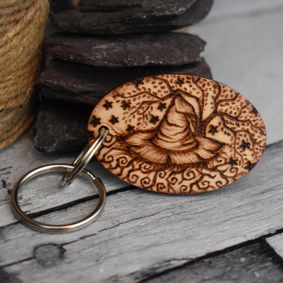 Witch hat with twisted tree. Pyrography personalised keyring. 