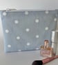 Large flat cotton zipped pouch, purse, make up bag in blue with white polka dots