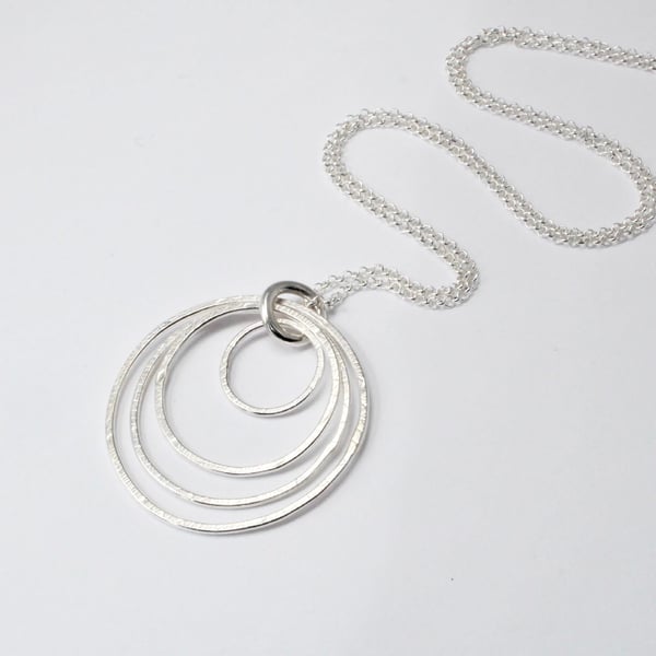 Silver four circle necklace
