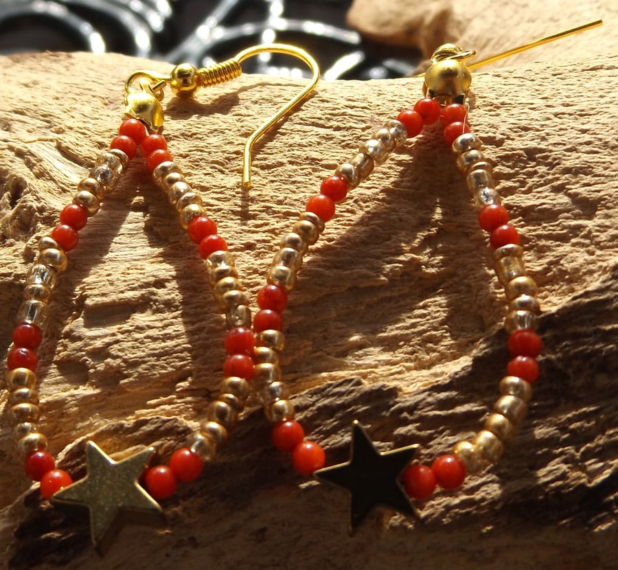 Gold plated red coral and seed beaded and Hematite gold star earrings