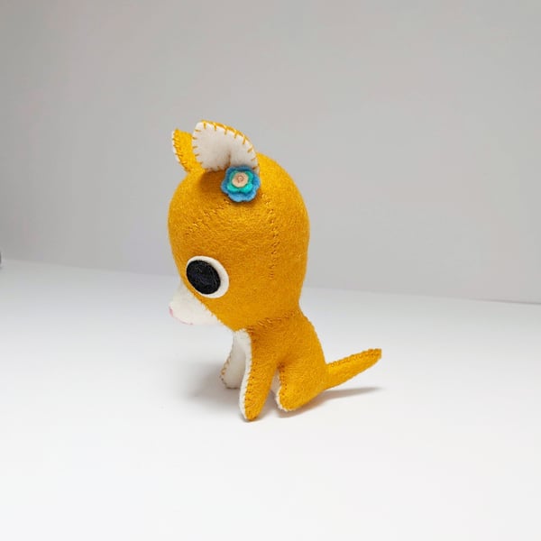 Ginger cat, felt ornament with a flower