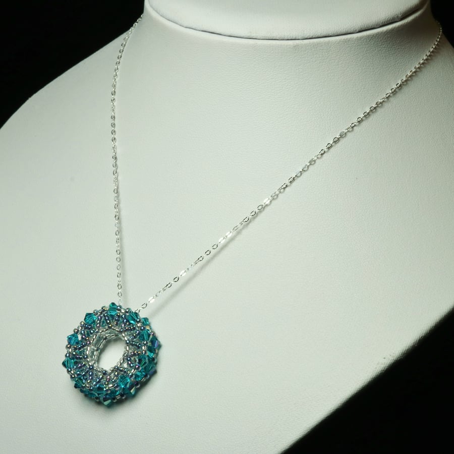 Sterling Silver and Crystal Indicolite Wheel Pendant