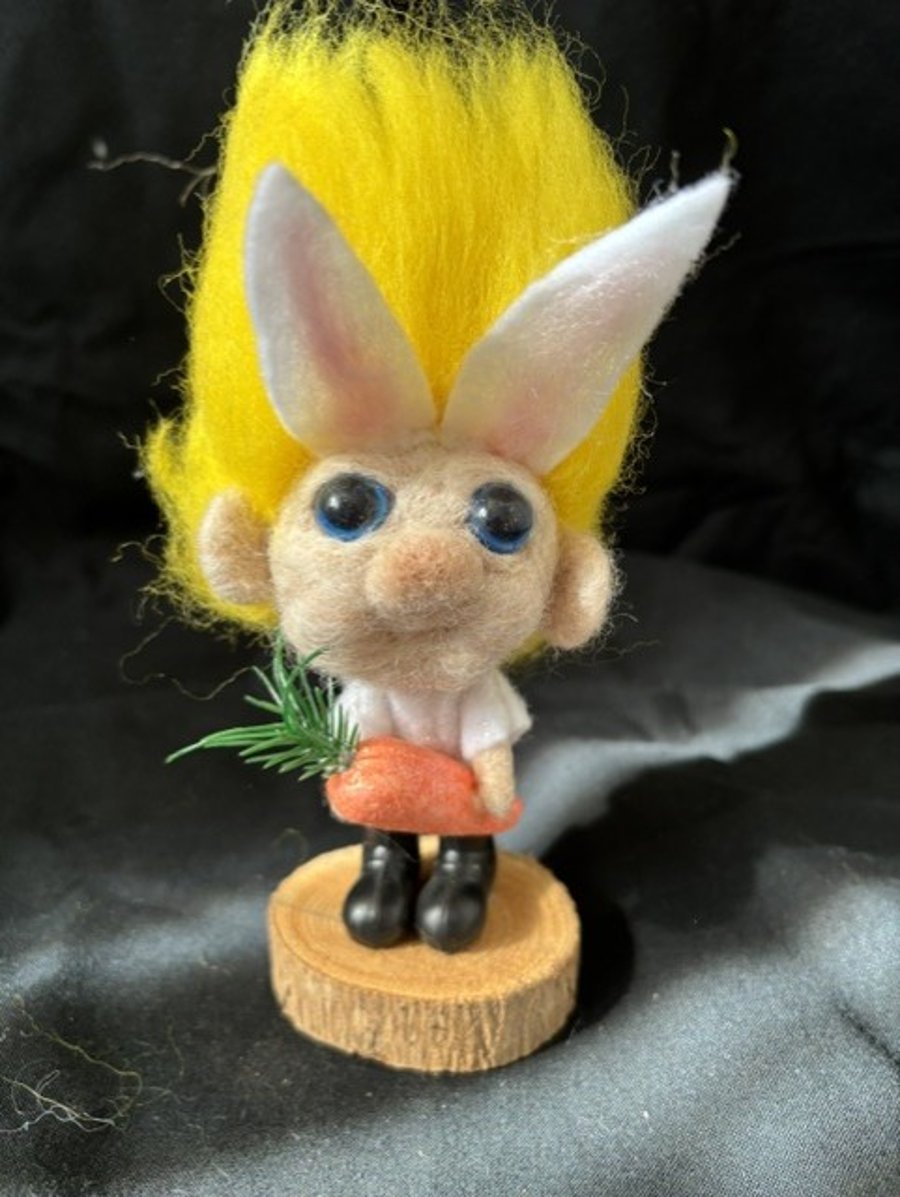 munchkin bunny in white dungerees