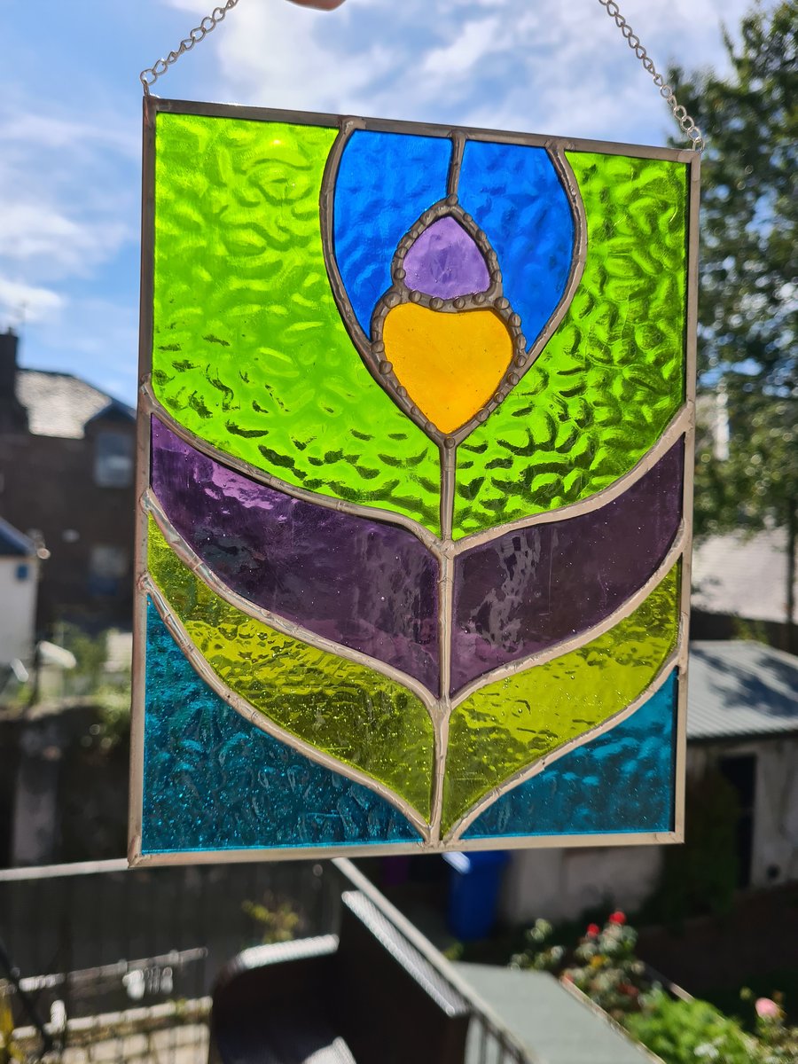 Stained glass peacock feather