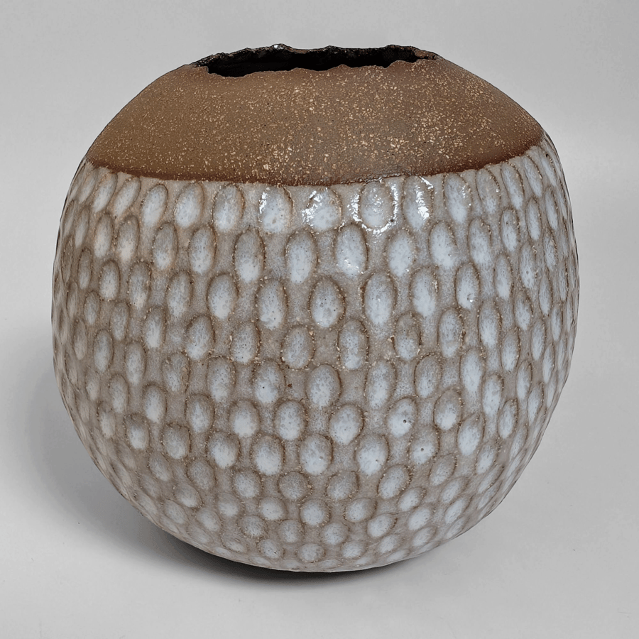 Coiled stoneware pot