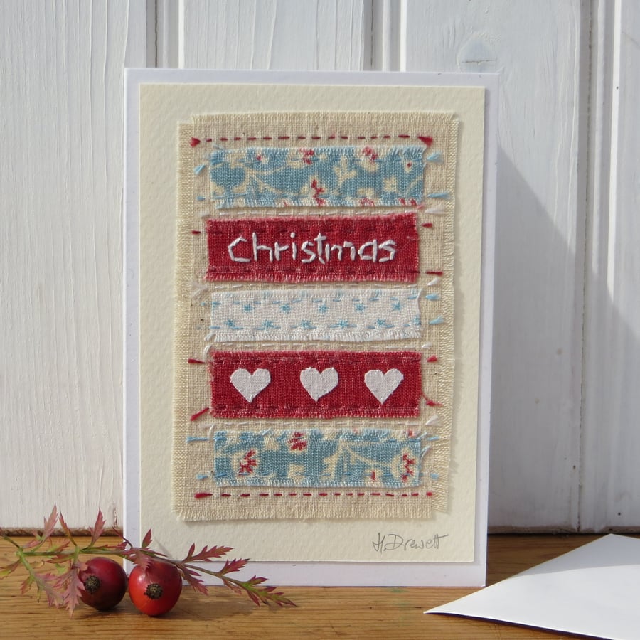 Hand stitched Christmas card with applique hearts and pretty fabrics
