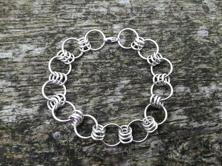 Silver 3 & 1 loop bracelet.