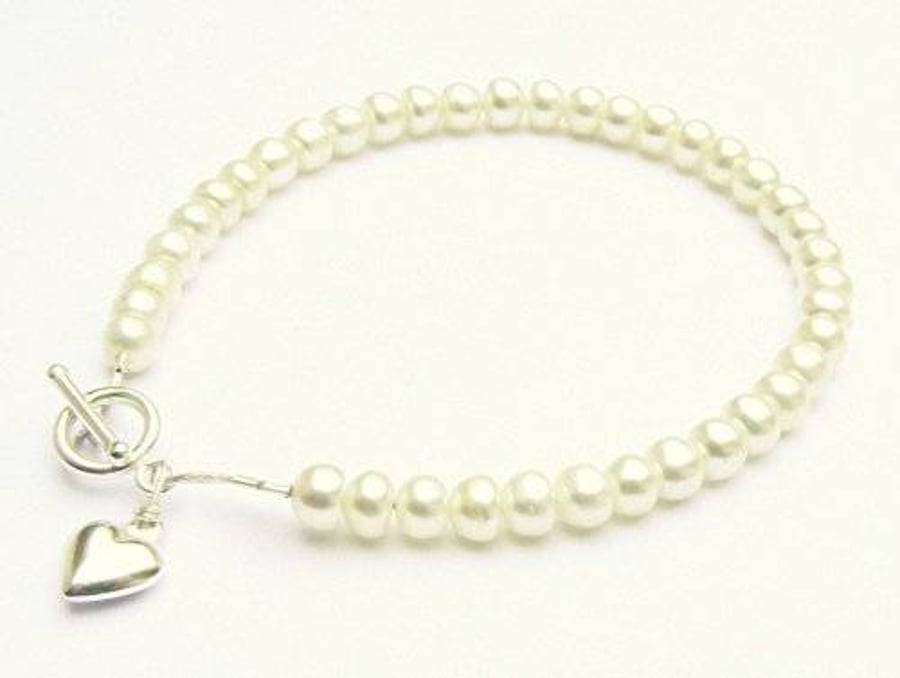 Ivory Freshwater Button Pearl Bracelet with Silver Heart Charm