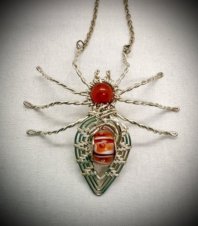 Silver wire wrapped Spider with Orange Agate