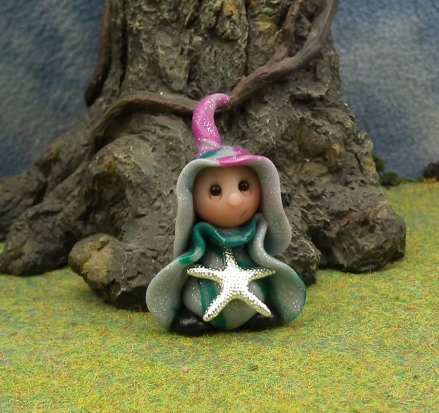 Tiny Beachcomber Gnome 'Osta' with starfish 1.5" OOAK Sculpt by Ann Galvin