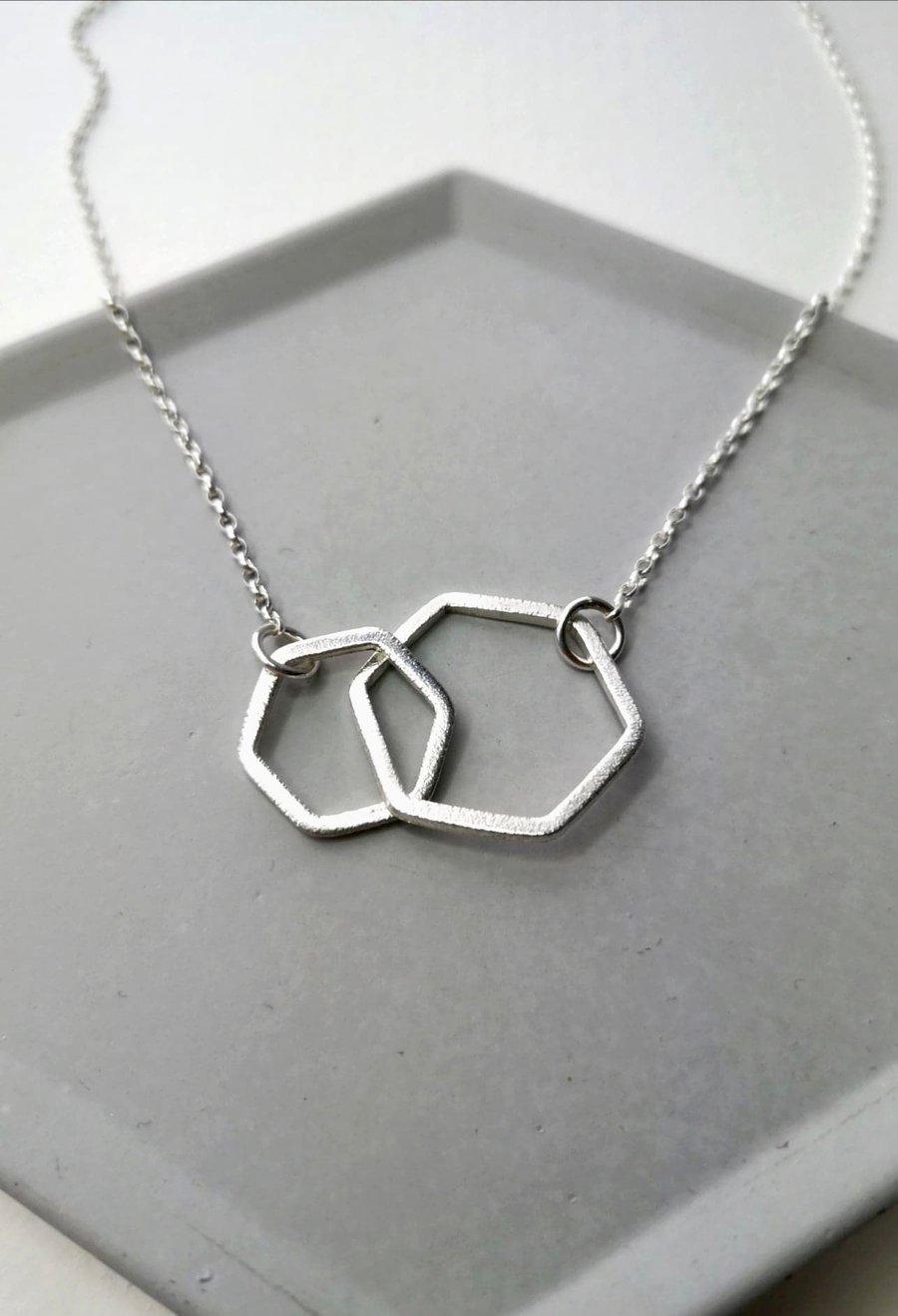 Interlinked hexagon necklace