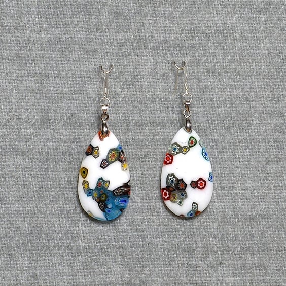 Non-identical Opaque White Glass Drop Earrings with Transparent Coloured Flowers