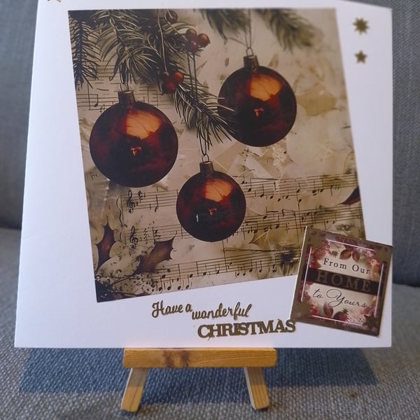Christmas decorations over a music sheet