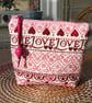 Zip top purse made in Emma Bridgewater Pink Sampler fabric.