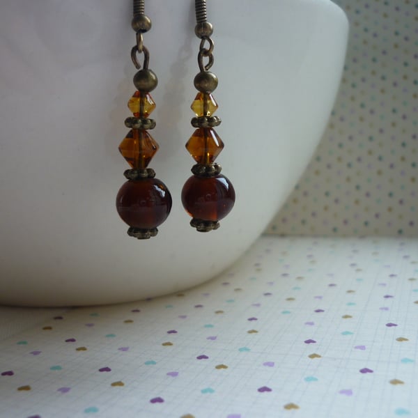 TOFFEE, LIGHT BROWN, GOLDEN YELLOW AND ANTIQUE BRONZE DANGLE EARRINGS.  