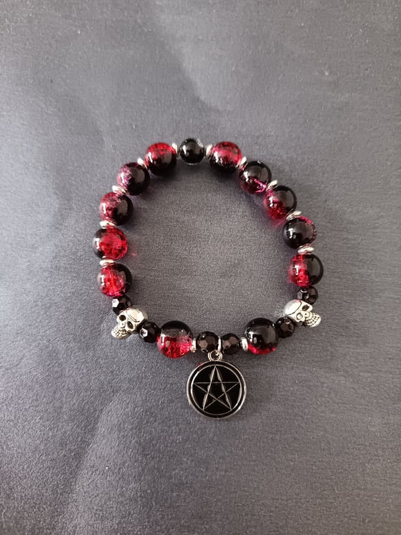 Elasticated gothic bracelet with skull beads and pentacle charm