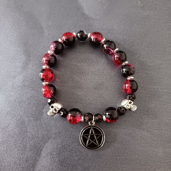 Elasticated gothic bracelet with skull beads and pentacle charm
