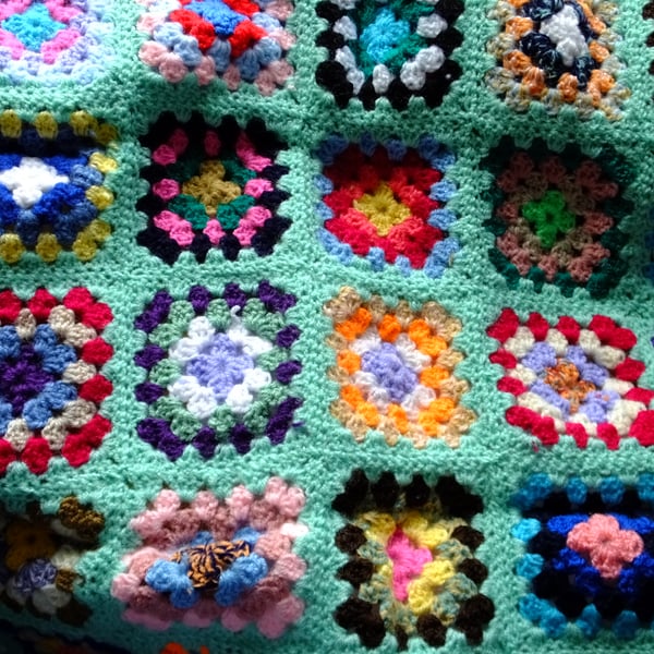 Green crochet baby or dolls blanket 40" x 32". For cot, pram or push chair.