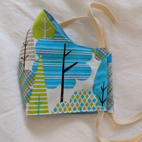 Cotton face mask with modern forest print