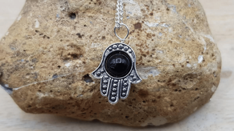 Black tourmaline Hamsa pendant necklace.