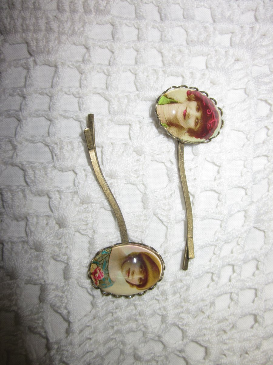 Pair of 'leave your hat on' glass cabochon hair grips