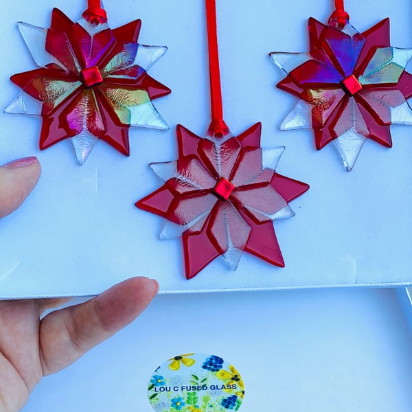 Trio of fused glass red irridescent star hanging decorations