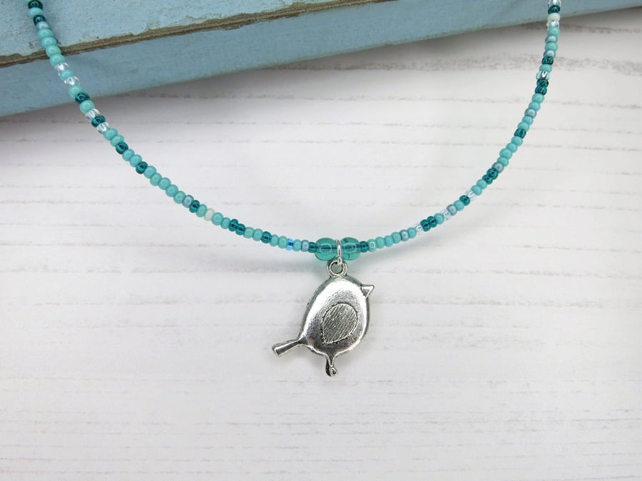Seed Bead Necklace with Metal Bird Charm - Turquoise