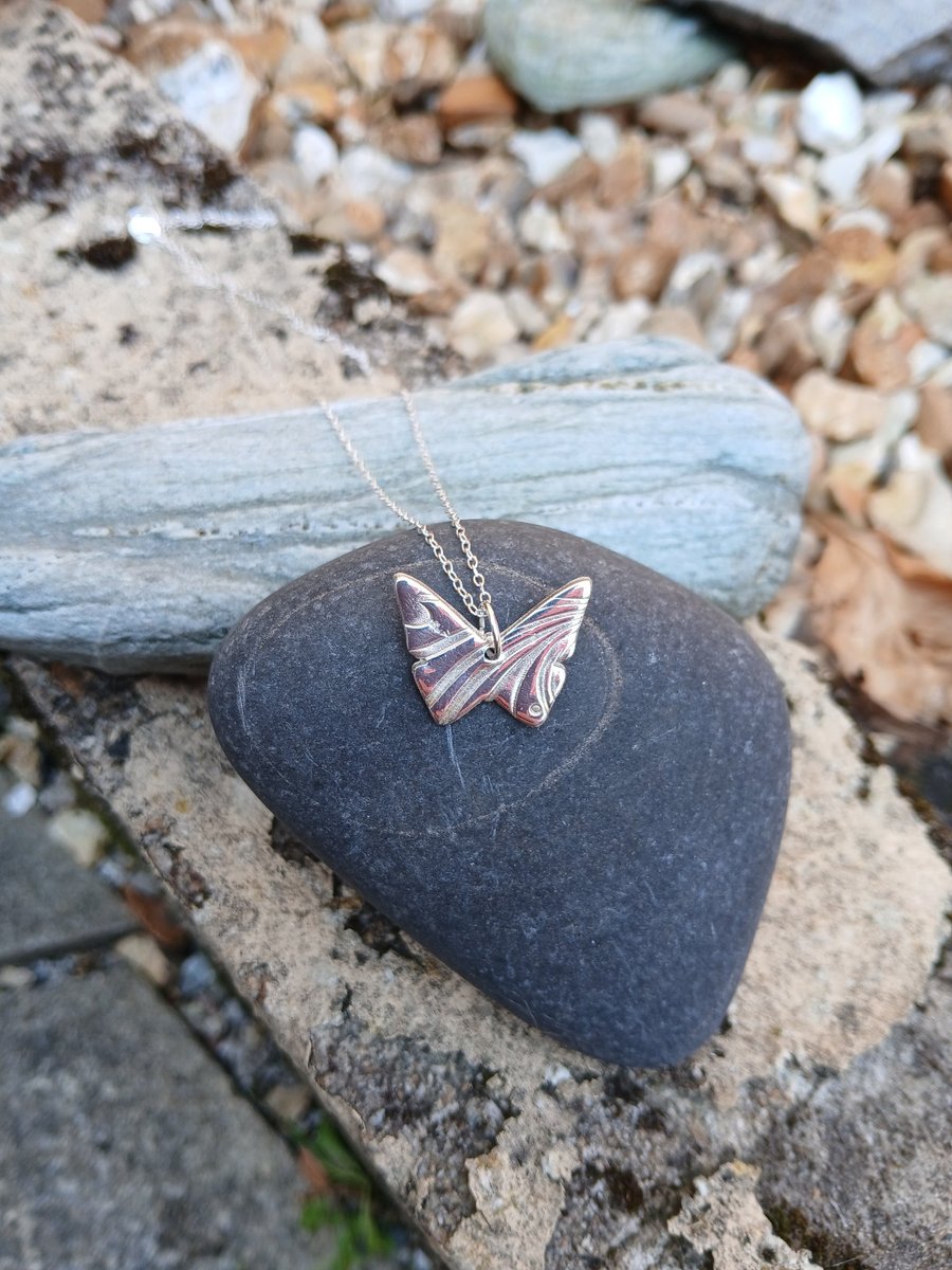 Silver butterfly pendant