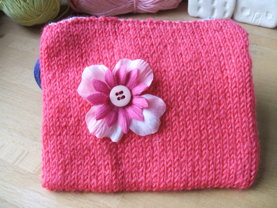 hand knitted small pink zipped purse with pink flower detail
