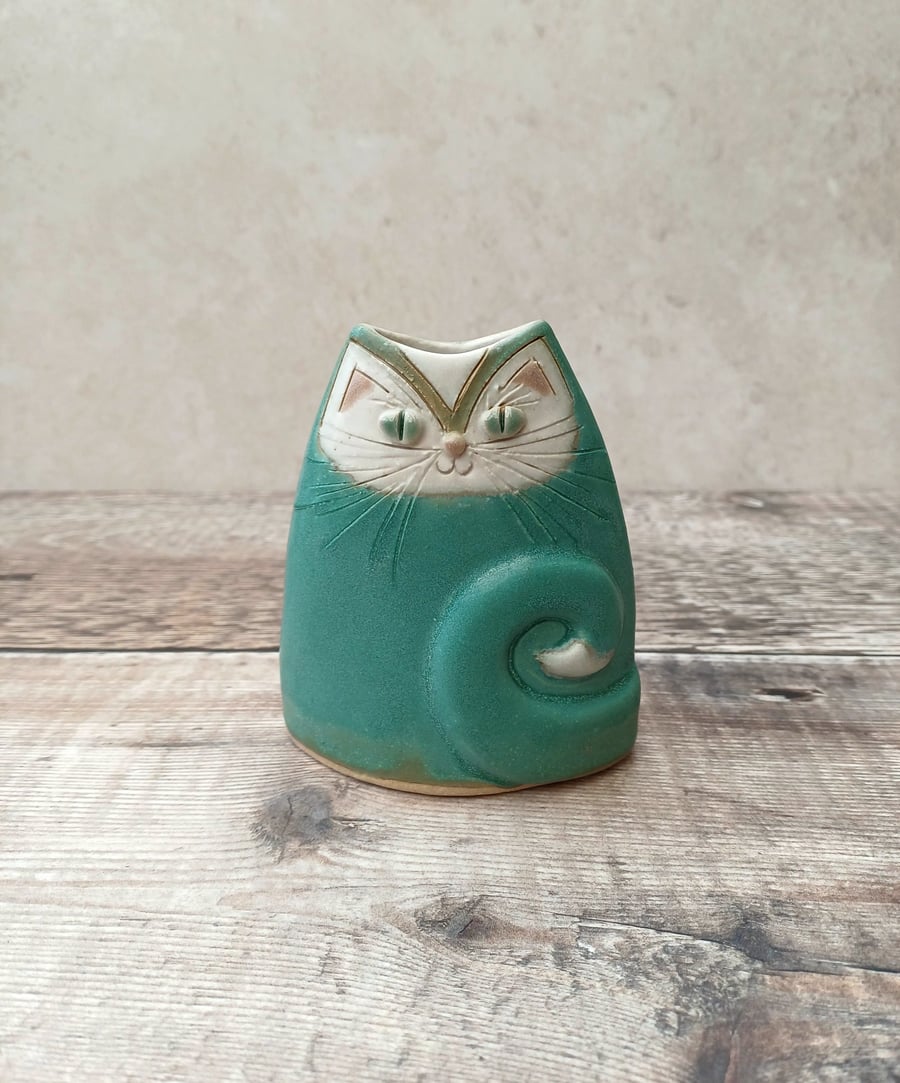 Small turquoise green pottery cat case