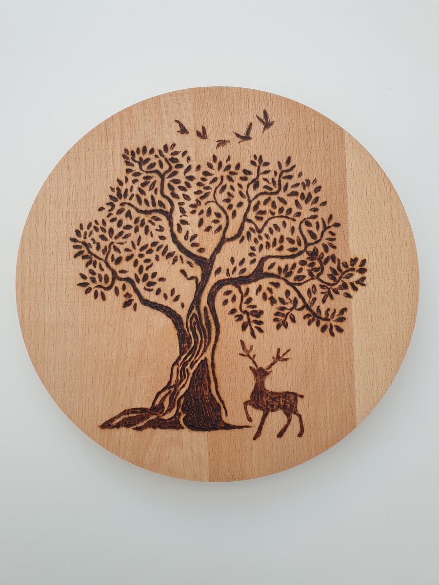 Wood burned circular chopping board 