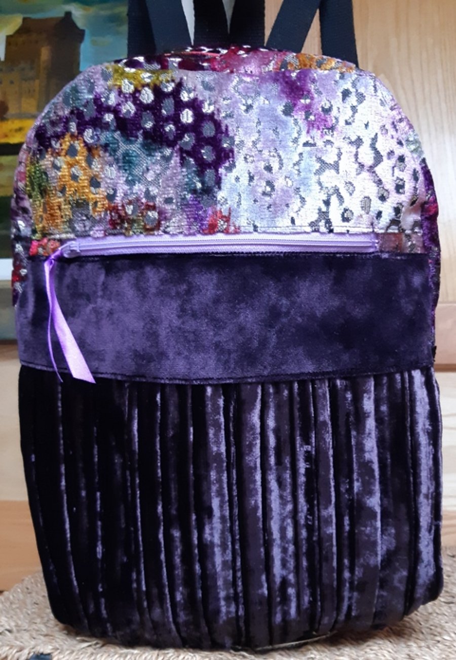 Plum pleated velvet backpack