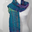 Handwoven Multicoloured Textured Scarf in a Mix of Synthetic Yarn..