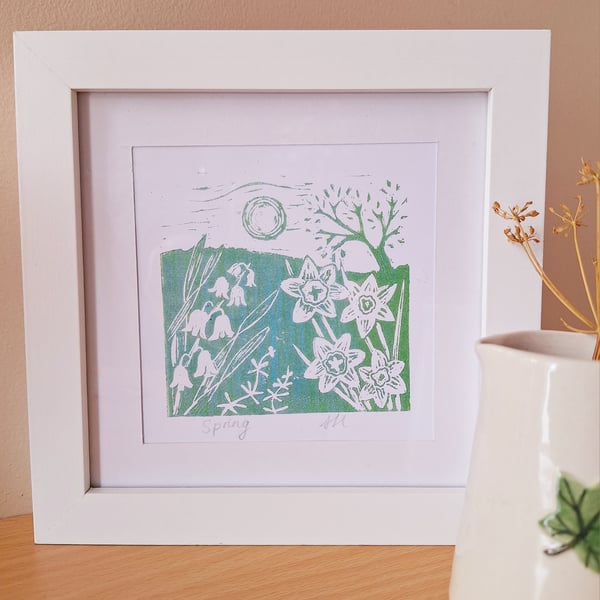 An original handprinted linoprint of a spring scene. 'Spring'.