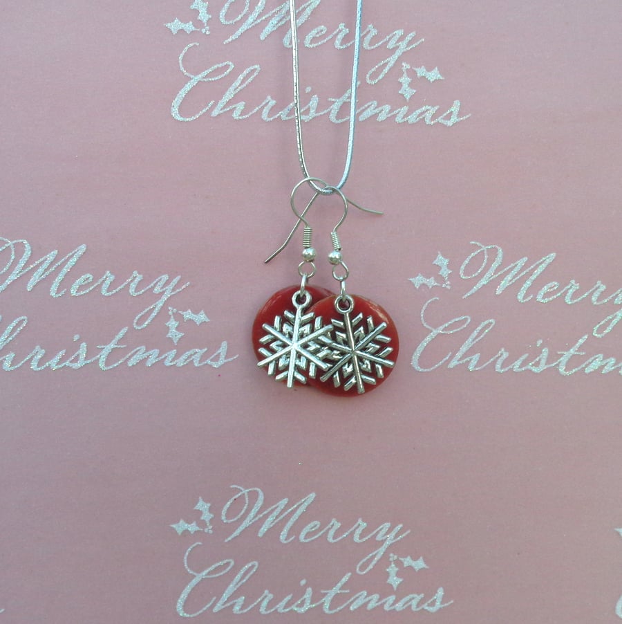 Christmas earrings Novelty snowflake charm on red 