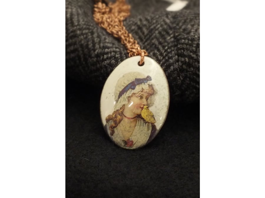 Girl with canary pendant