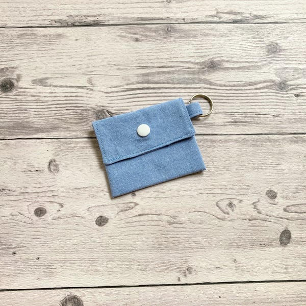 Plain light blue colour round lip balm keyring, keychain. Lipstick holder.