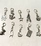 Clip on charms with lobster clasps, various designs shown.