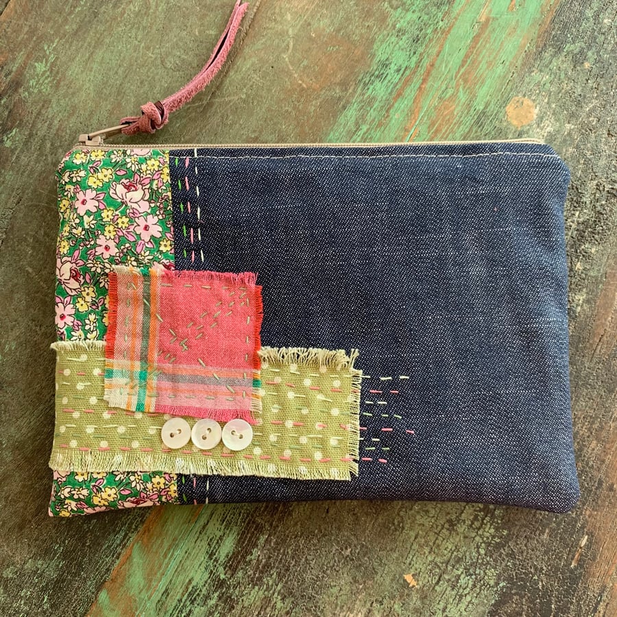 Patchy denim pouch with embroidery