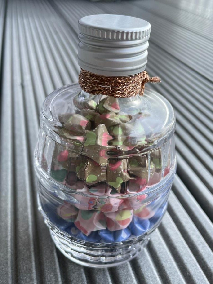 "Heart-woven Treasures" Folded Lucky Stars in Barrel shaped bottle