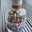 "Heart-woven Treasures" Folded Lucky Stars in Barrel shaped bottle